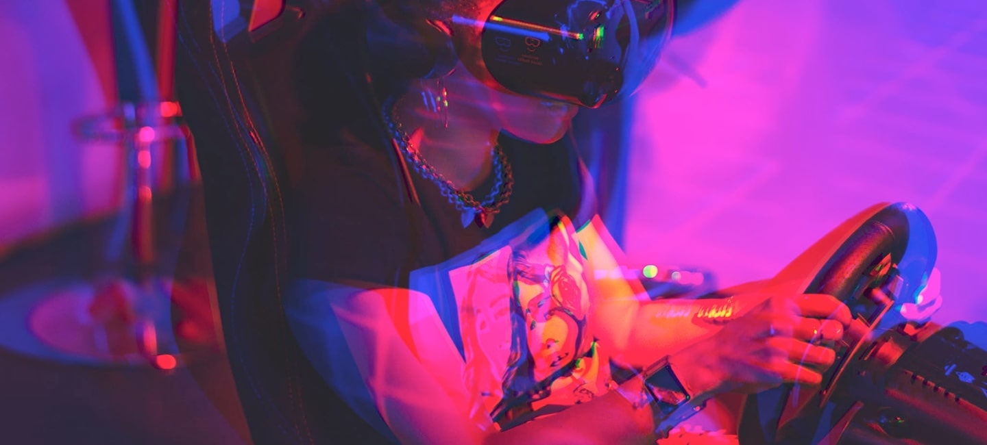 A young person enthusiastically playing VR racing game